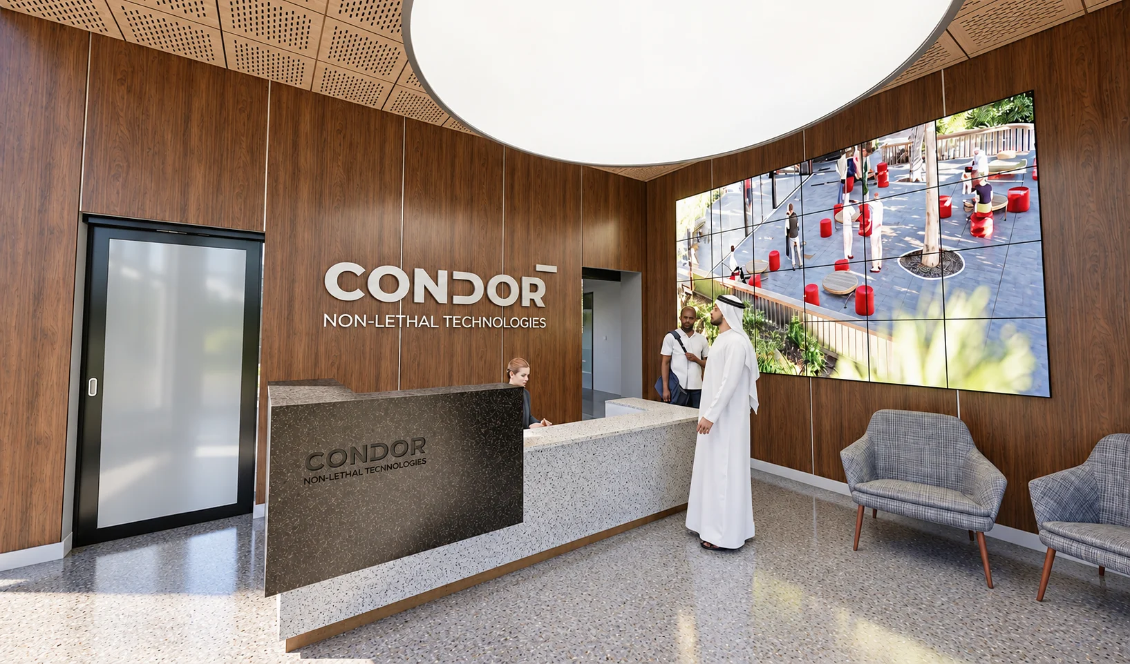 Recepção da Condor: parede em madeira com a marca aplicada, balcão em terrazzo, videowall e poltronas de espera
