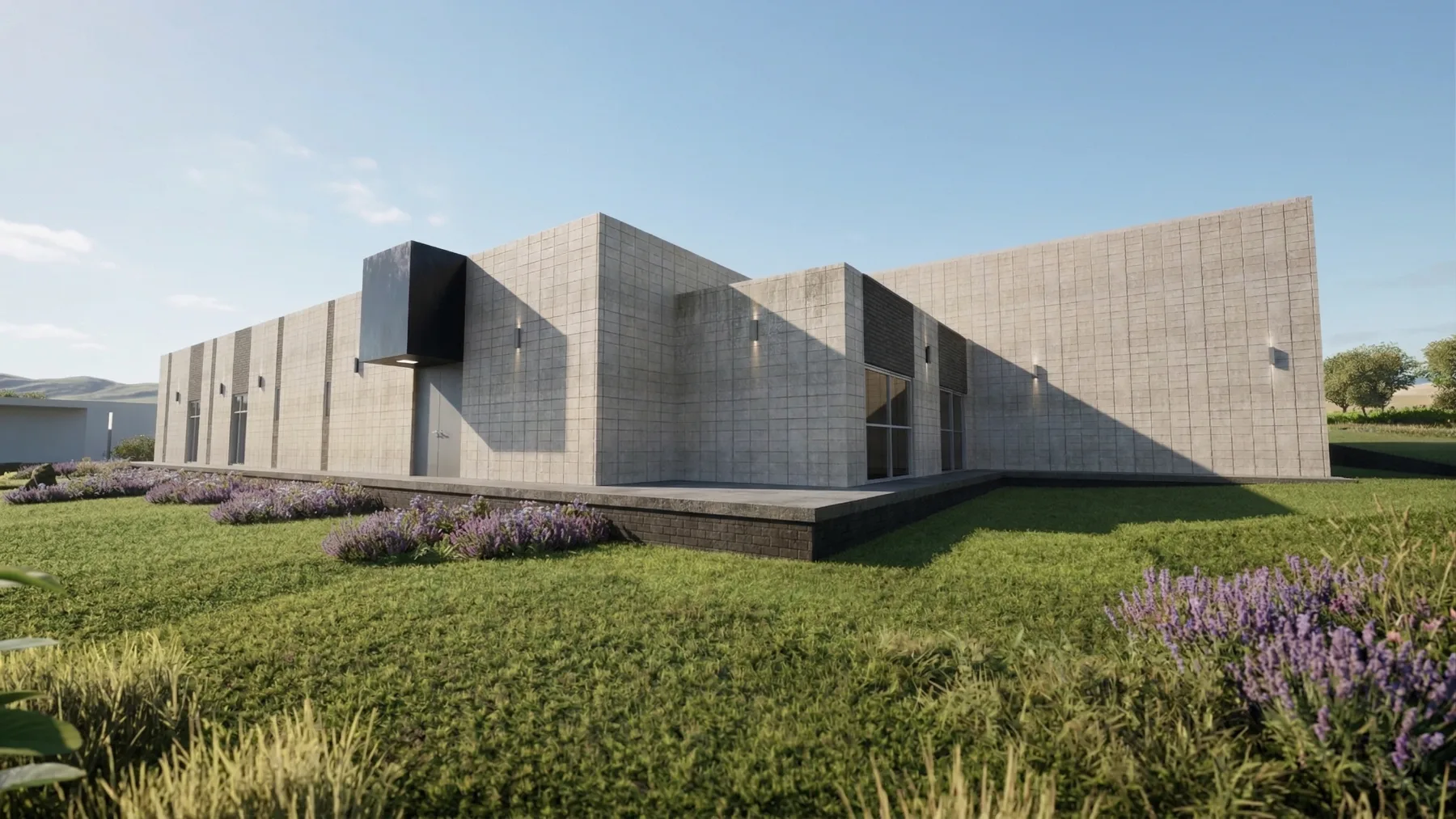 Volume em concreto aparente visto da lateral, com terraço rebaixado e vegetação junto à base
