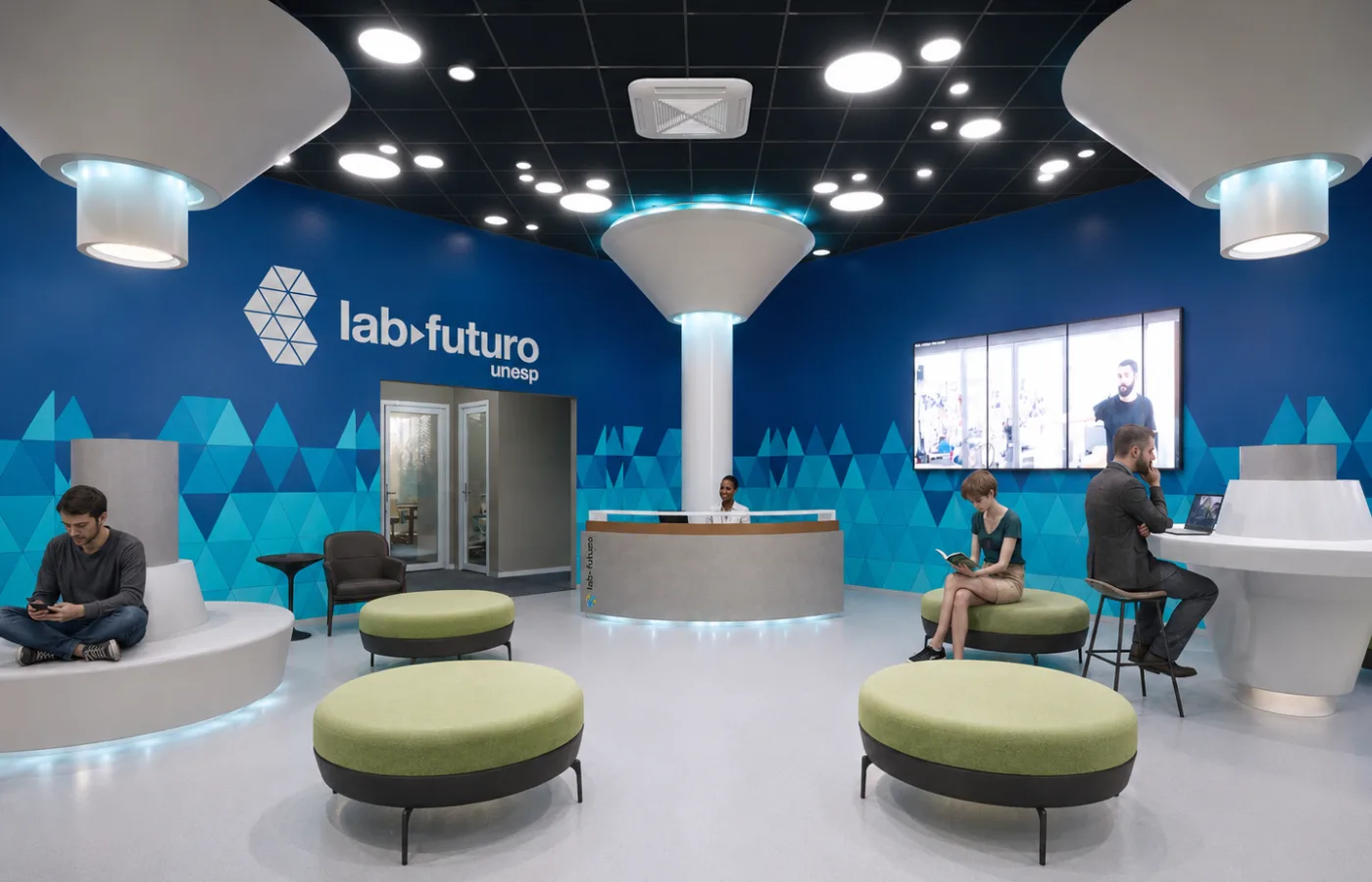 LAB Futuro UNESP: recepção e área de convivência com estações de trabalho e ambientes de apoio